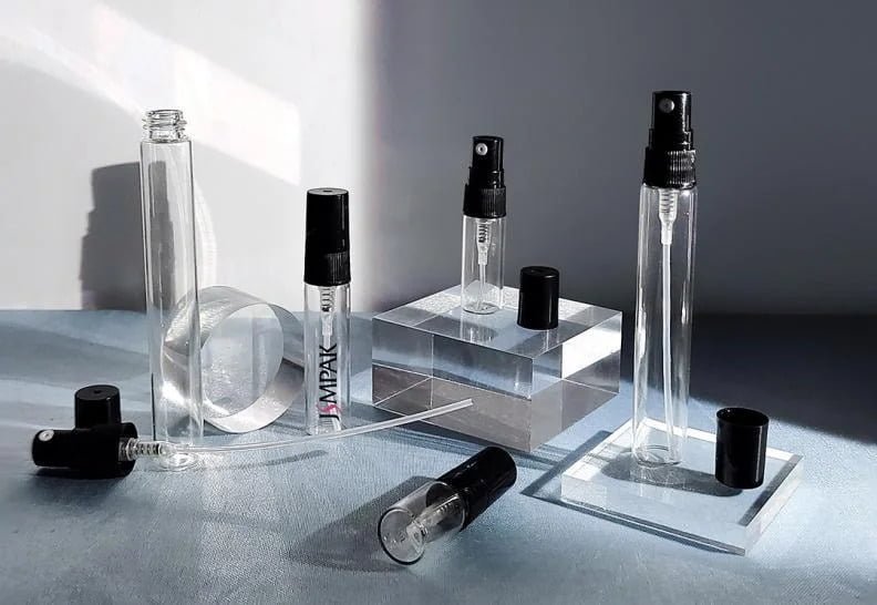 Transparent spray bottles of different sizes